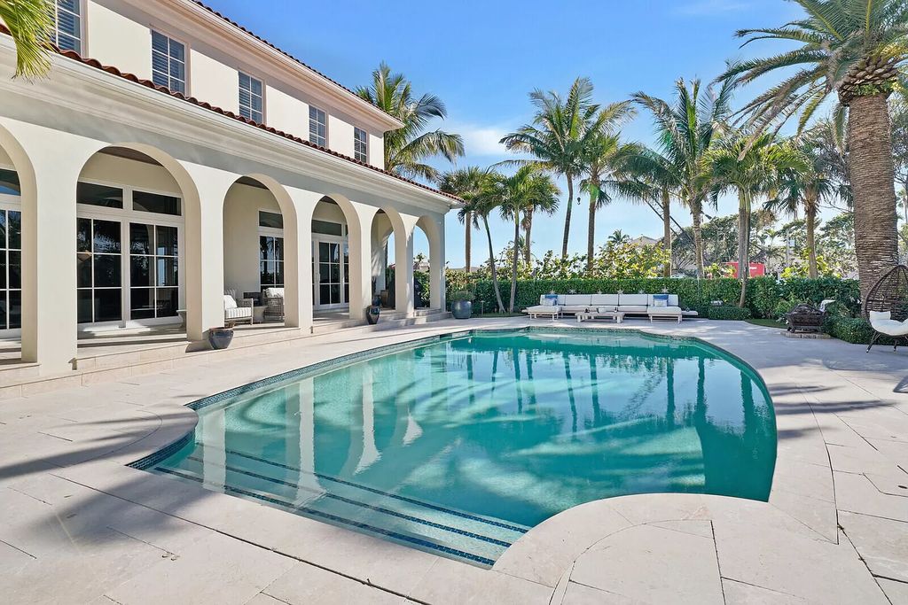 The Lake Worth Mansion is a contemporary South Florida ultra luxury waterfront real estate masterpiece boasting unparalleled resort inspired comforts now available for sale. This home located at 1400 S Ocean Blvd, Lake Worth, Florida