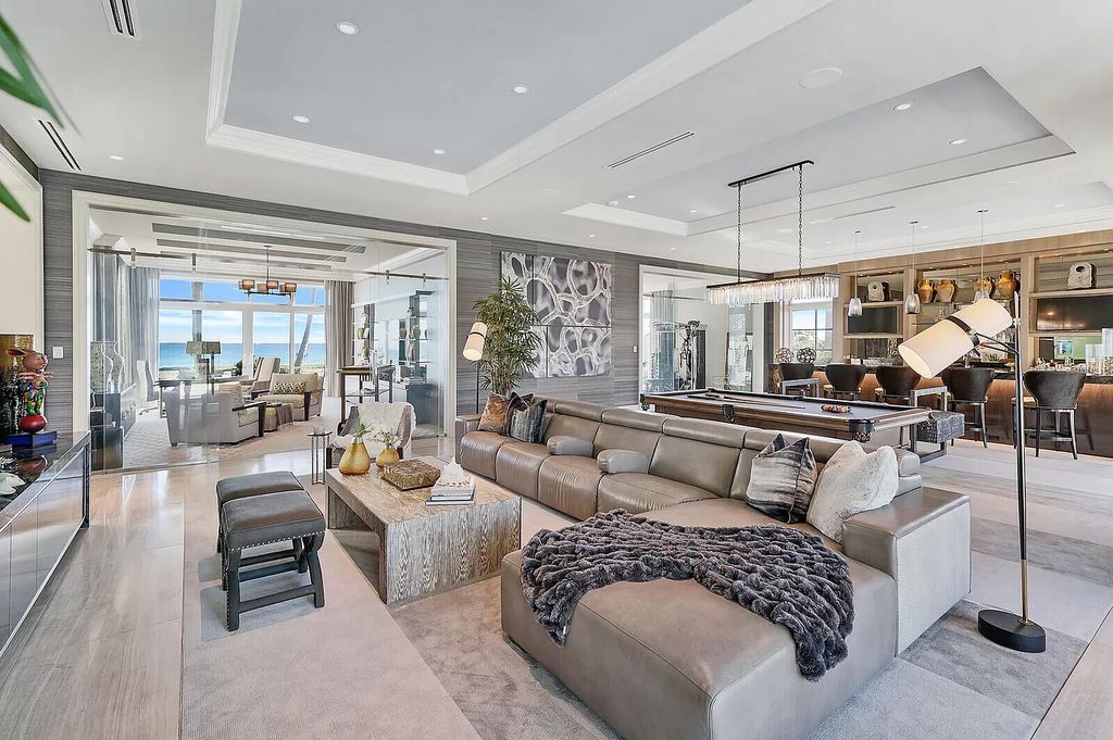 The Lake Worth Mansion is a contemporary South Florida ultra luxury waterfront real estate masterpiece boasting unparalleled resort inspired comforts now available for sale. This home located at 1400 S Ocean Blvd, Lake Worth, Florida