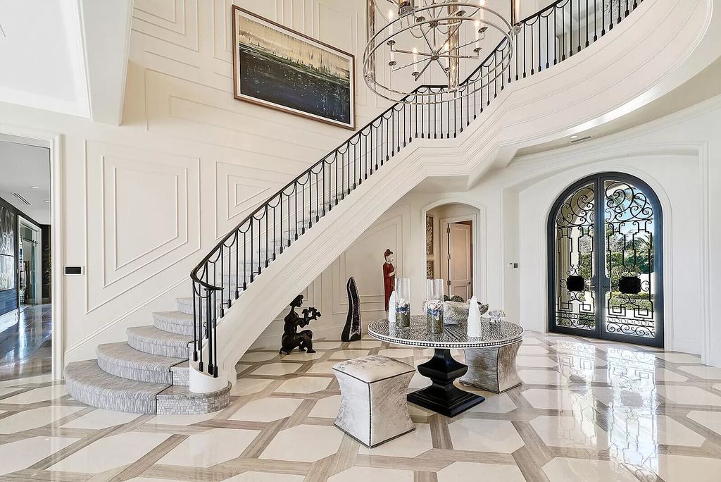 The Lake Worth Mansion is a contemporary South Florida ultra luxury waterfront real estate masterpiece boasting unparalleled resort inspired comforts now available for sale. This home located at 1400 S Ocean Blvd, Lake Worth, Florida