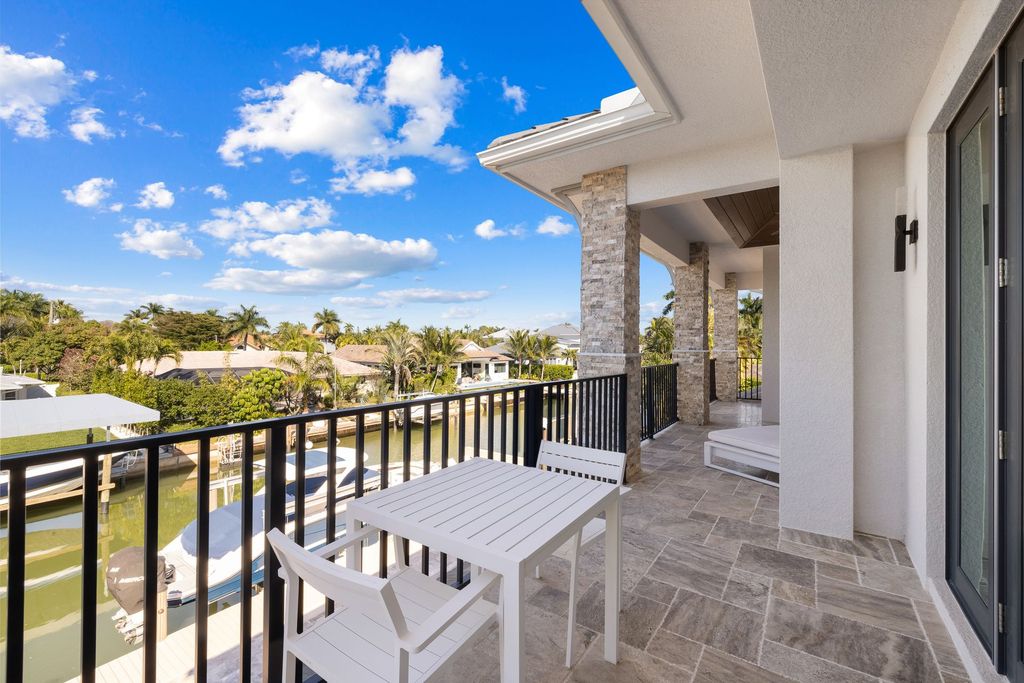 The Home in Naples is a sleek estate with a spacious interior and exquisite finishes on every surface now available for sale. This home located at 1275 Wahoo Ct, Naples, Florida