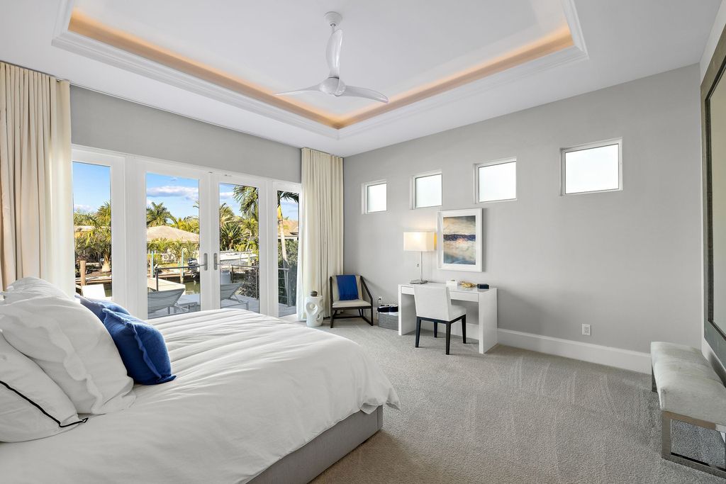 The Home in Naples is a sleek estate with a spacious interior and exquisite finishes on every surface now available for sale. This home located at 1275 Wahoo Ct, Naples, Florida