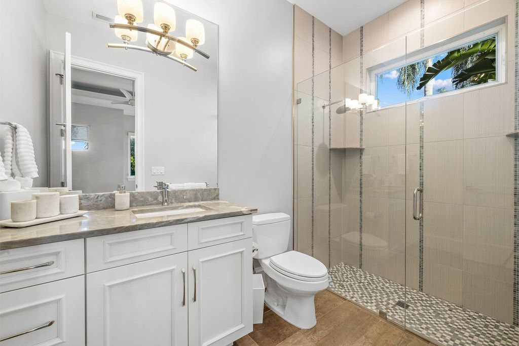 The Home in Naples is a sleek estate with a spacious interior and exquisite finishes on every surface now available for sale. This home located at 1275 Wahoo Ct, Naples, Florida