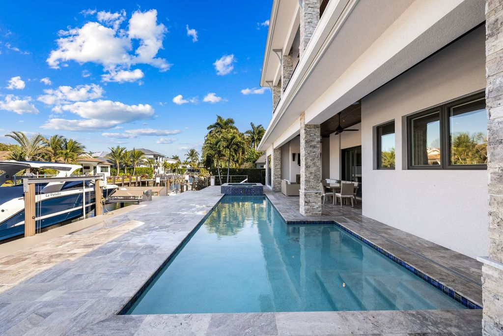 The Home in Naples is a sleek estate with a spacious interior and exquisite finishes on every surface now available for sale. This home located at 1275 Wahoo Ct, Naples, Florida