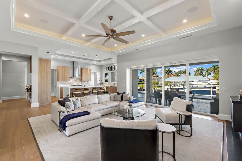 The Home in Naples is a sleek estate with a spacious interior and exquisite finishes on every surface now available for sale. This home located at 1275 Wahoo Ct, Naples, Florida