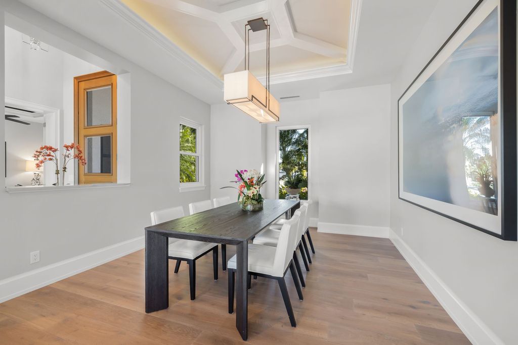 The Home in Naples is a sleek estate with a spacious interior and exquisite finishes on every surface now available for sale. This home located at 1275 Wahoo Ct, Naples, Florida