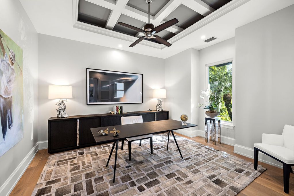 The Home in Naples is a sleek estate with a spacious interior and exquisite finishes on every surface now available for sale. This home located at 1275 Wahoo Ct, Naples, Florida
