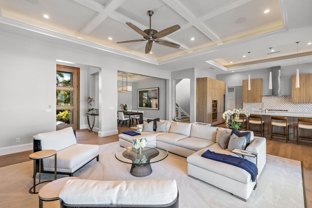 The Home in Naples is a sleek estate with a spacious interior and exquisite finishes on every surface now available for sale. This home located at 1275 Wahoo Ct, Naples, Florida
