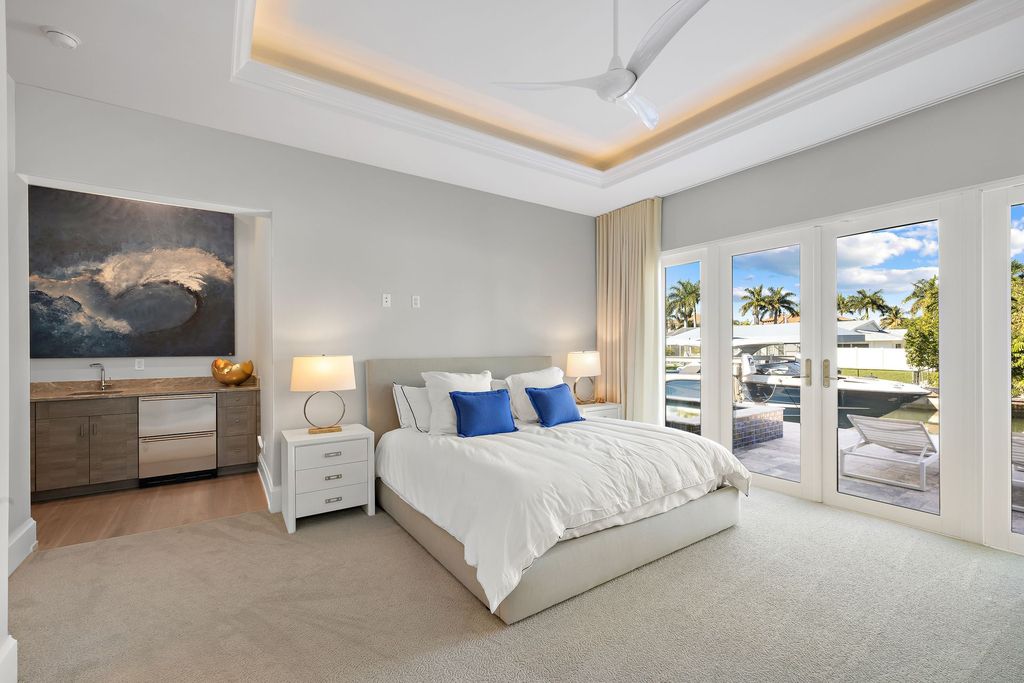 The Home in Naples is a sleek estate with a spacious interior and exquisite finishes on every surface now available for sale. This home located at 1275 Wahoo Ct, Naples, Florida