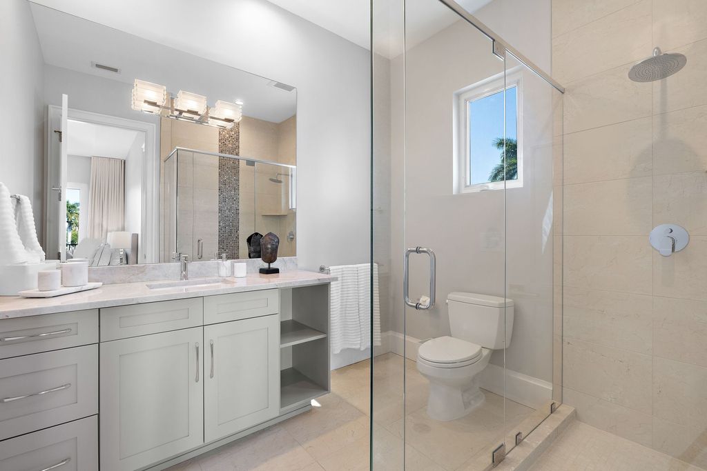 The Home in Naples is a sleek estate with a spacious interior and exquisite finishes on every surface now available for sale. This home located at 1275 Wahoo Ct, Naples, Florida