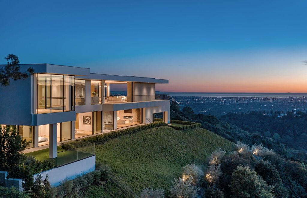 The Mansion in Beverly Hills is a serene architectural masterpiece sitting on the best lot in the ultra-exclusive Trousdale Estates enclave now available for sale. This home located at 620 Arkell Dr, Beverly Hills, California