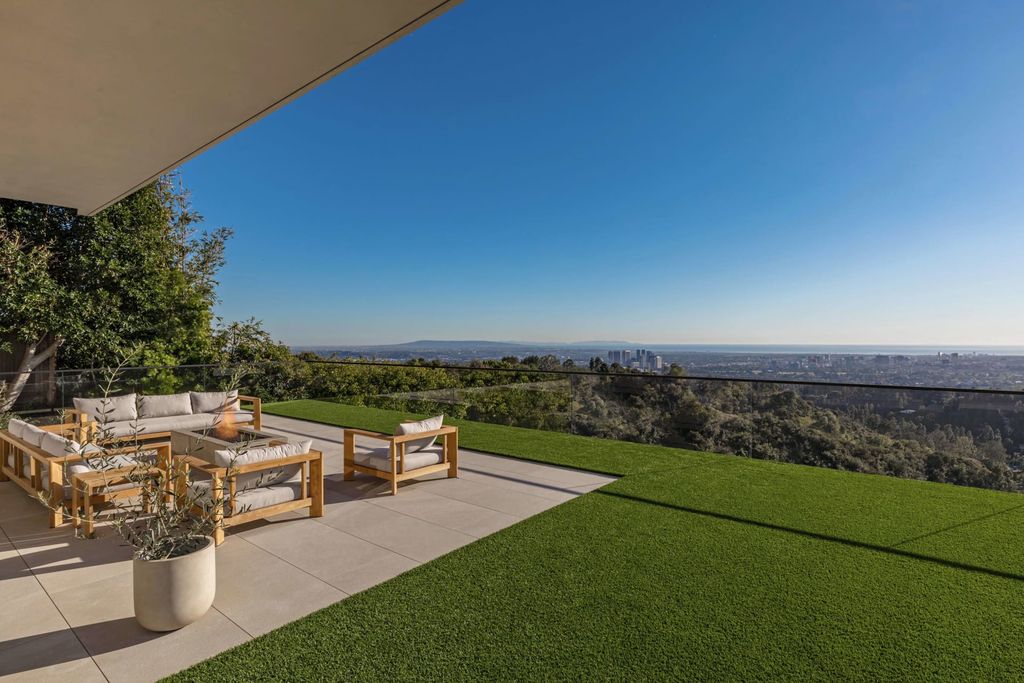 The Mansion in Beverly Hills is a serene architectural masterpiece sitting on the best lot in the ultra-exclusive Trousdale Estates enclave now available for sale. This home located at 620 Arkell Dr, Beverly Hills, California