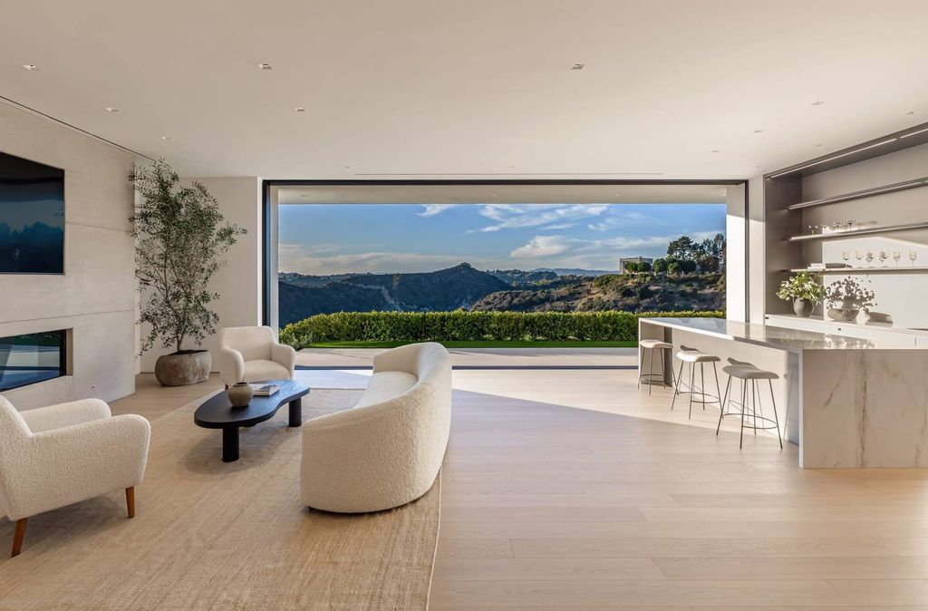 The Mansion in Beverly Hills is a serene architectural masterpiece sitting on the best lot in the ultra-exclusive Trousdale Estates enclave now available for sale. This home located at 620 Arkell Dr, Beverly Hills, California
