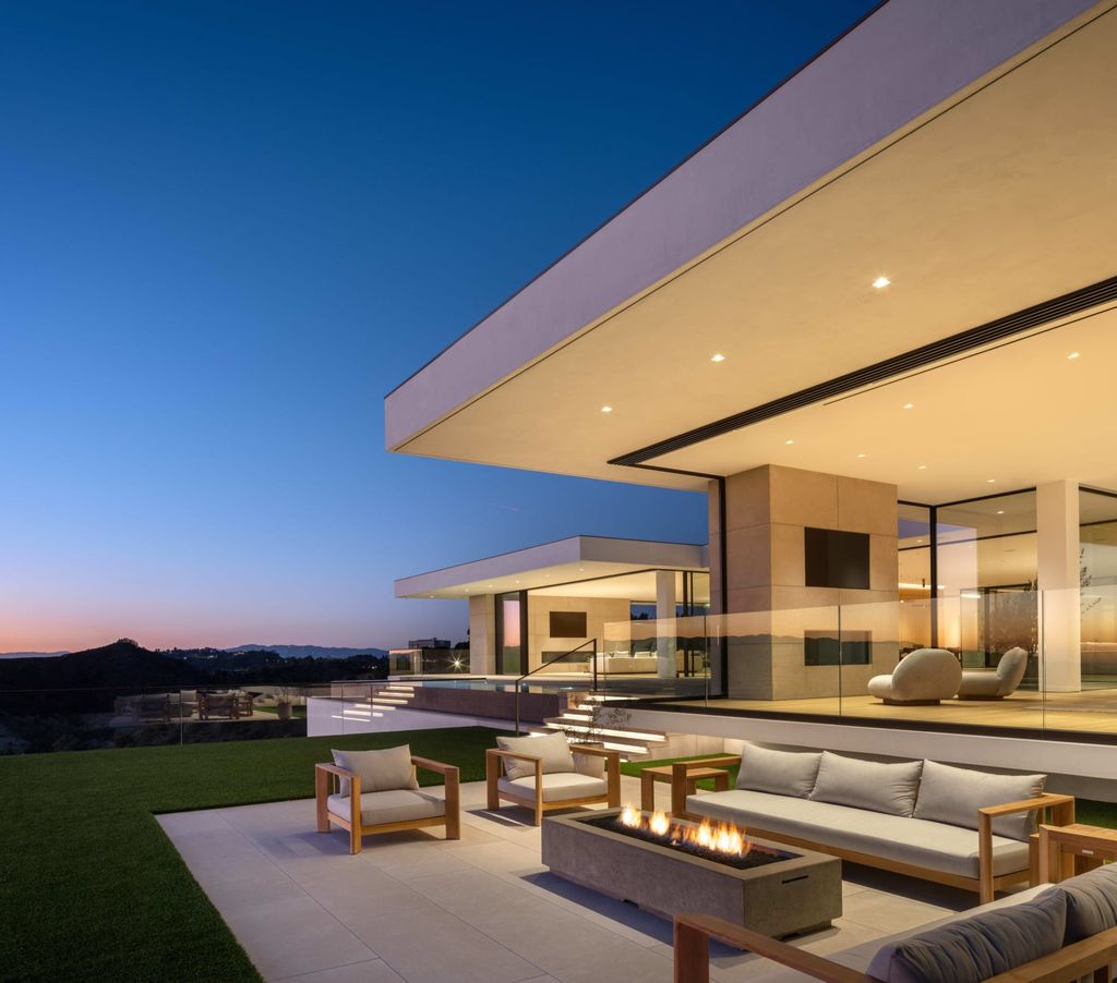 The Mansion in Beverly Hills is a serene architectural masterpiece sitting on the best lot in the ultra-exclusive Trousdale Estates enclave now available for sale. This home located at 620 Arkell Dr, Beverly Hills, California