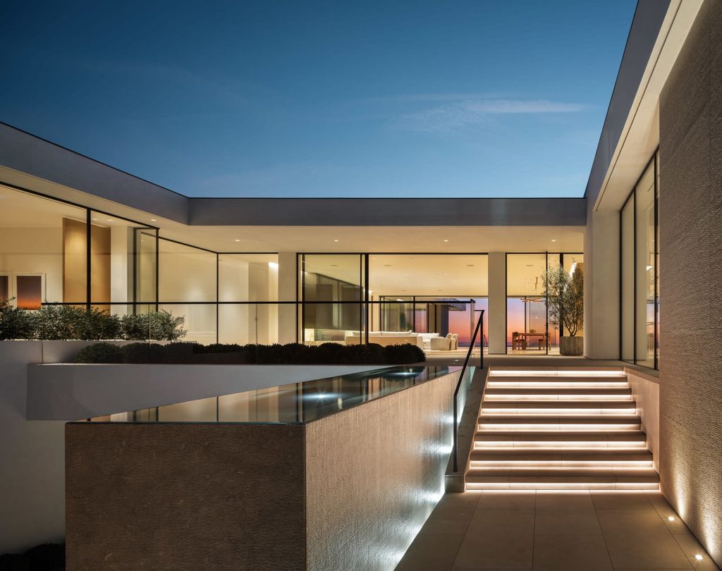 The Mansion in Beverly Hills is a serene architectural masterpiece sitting on the best lot in the ultra-exclusive Trousdale Estates enclave now available for sale. This home located at 620 Arkell Dr, Beverly Hills, California