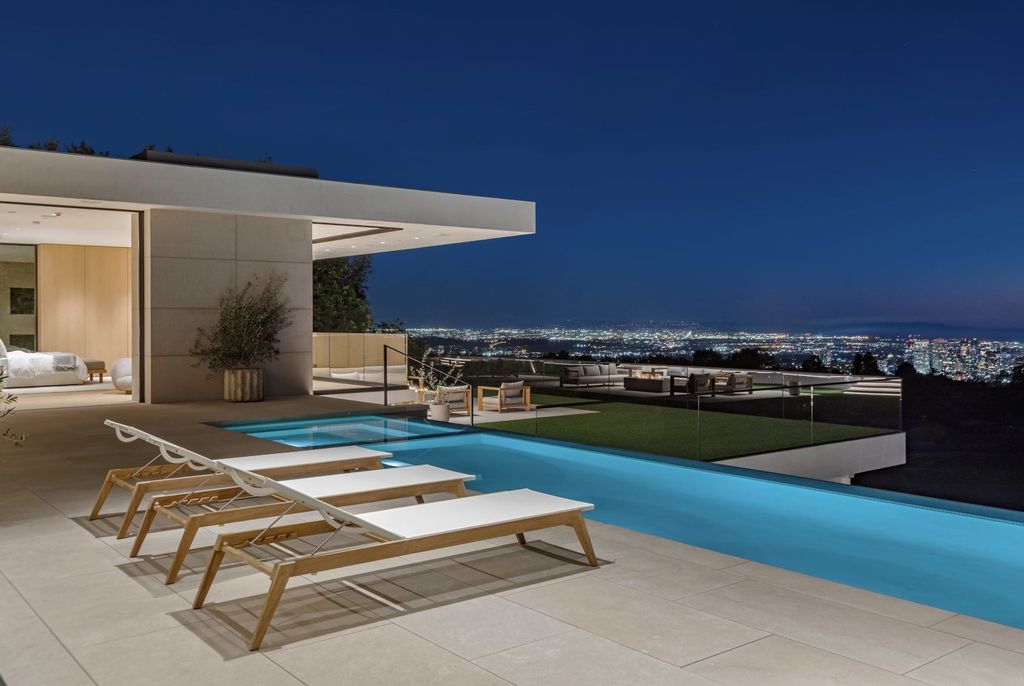The Mansion in Beverly Hills is a serene architectural masterpiece sitting on the best lot in the ultra-exclusive Trousdale Estates enclave now available for sale. This home located at 620 Arkell Dr, Beverly Hills, California