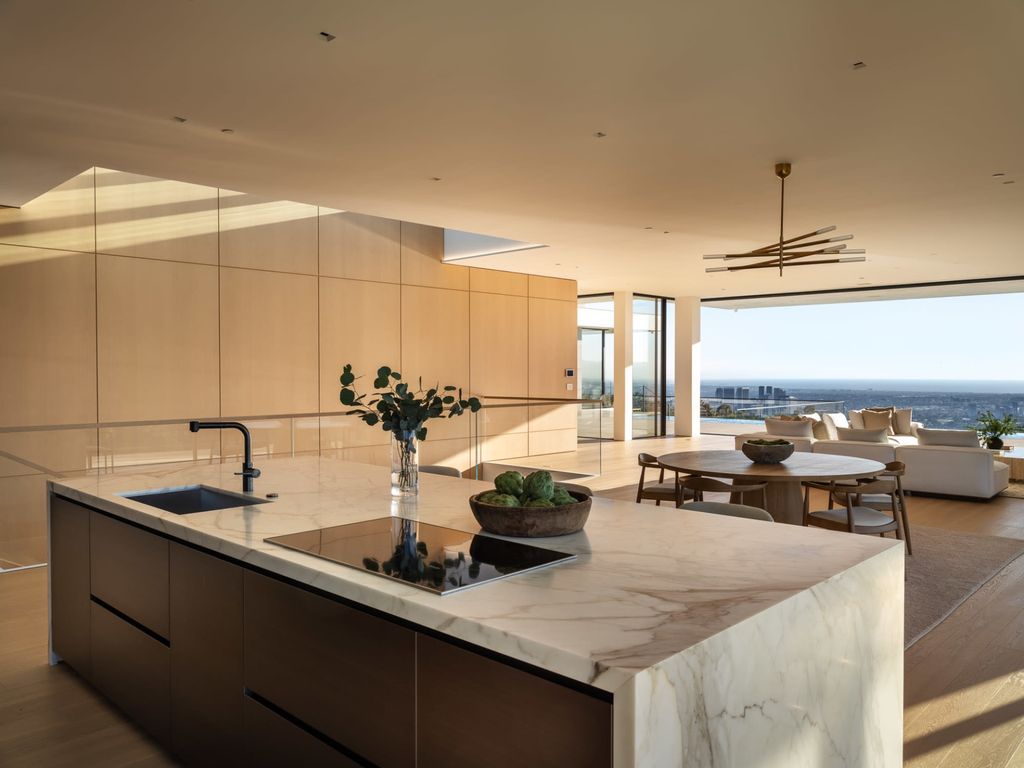The Mansion in Beverly Hills is a serene architectural masterpiece sitting on the best lot in the ultra-exclusive Trousdale Estates enclave now available for sale. This home located at 620 Arkell Dr, Beverly Hills, California