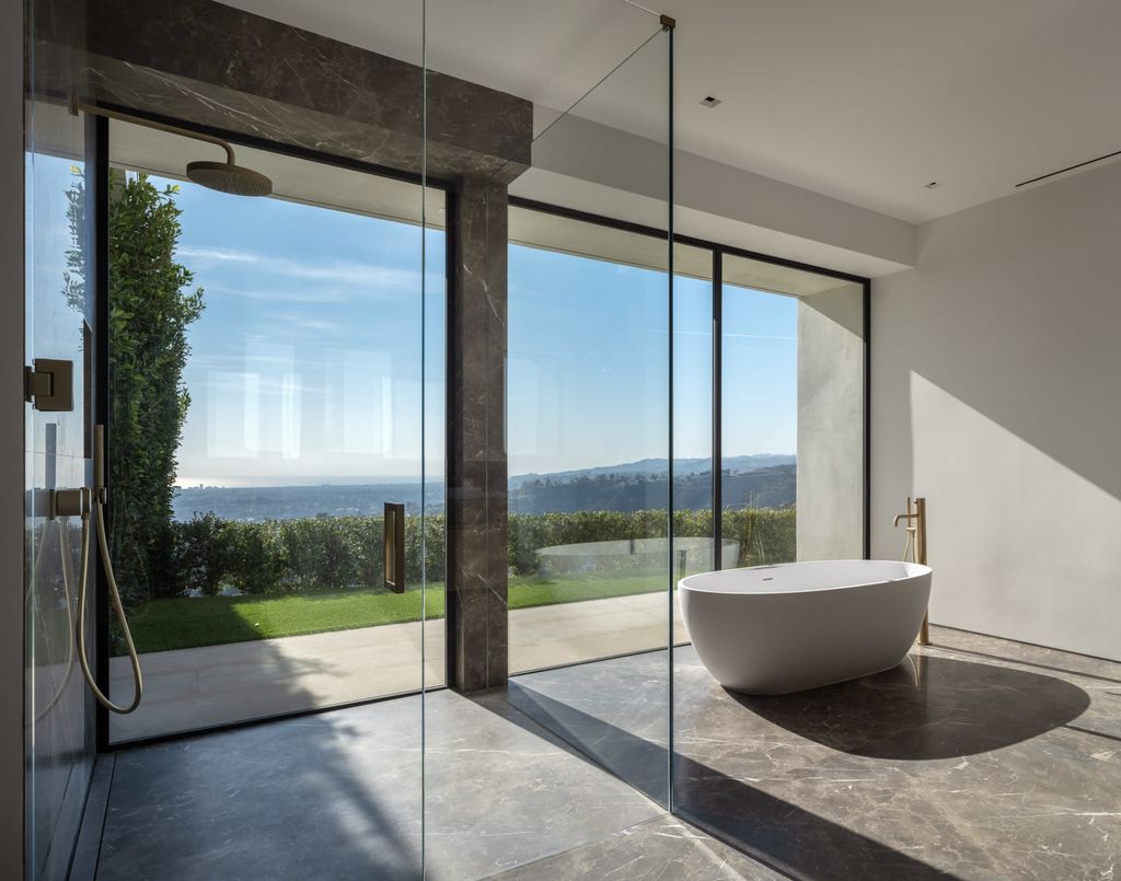 The Mansion in Beverly Hills is a serene architectural masterpiece sitting on the best lot in the ultra-exclusive Trousdale Estates enclave now available for sale. This home located at 620 Arkell Dr, Beverly Hills, California