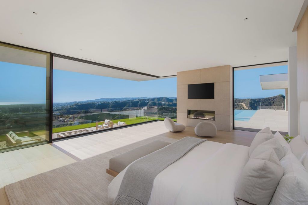 The Mansion in Beverly Hills is a serene architectural masterpiece sitting on the best lot in the ultra-exclusive Trousdale Estates enclave now available for sale. This home located at 620 Arkell Dr, Beverly Hills, California