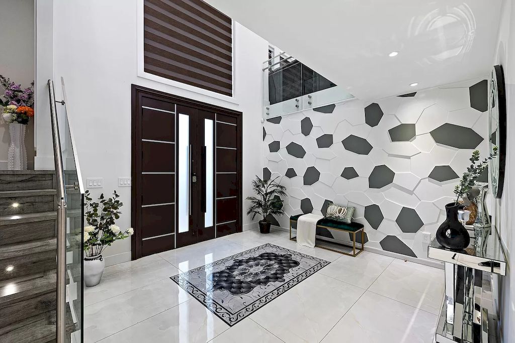 The House in Surrey has 3 storey with the massive media room and bar room add some extra space for entertaining your guests, now available for sale