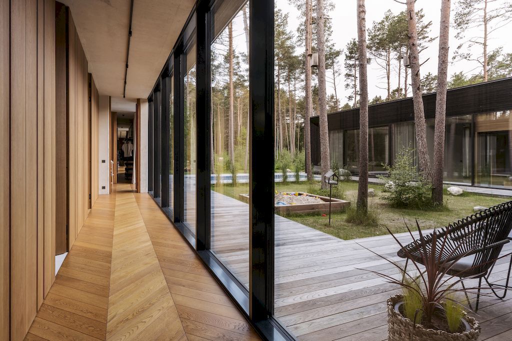 U shaped House Estonian wraps around a private garden by Kuu Arhitektid 11