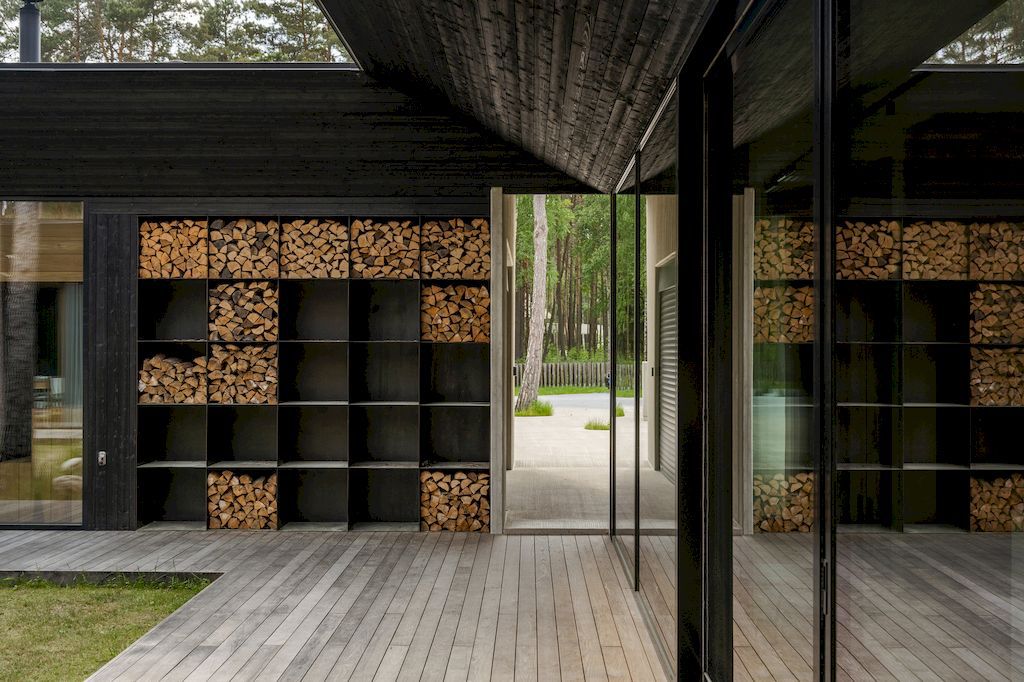 U shaped House Estonian wraps around a private garden by Kuu Arhitektid 17