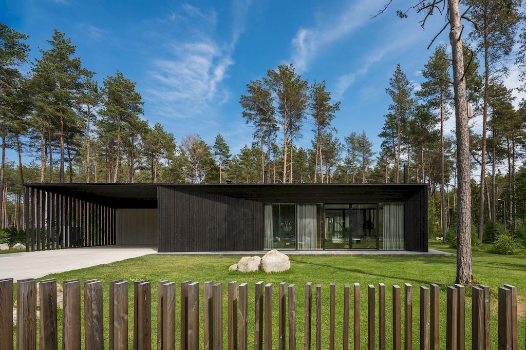 U shaped House Estonian wraps around a private garden by Kuu Arhitektid 3