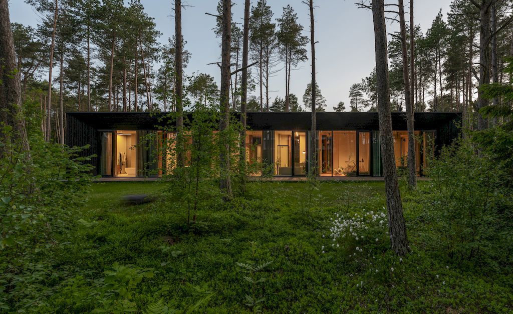 U shaped House Estonian wraps around a private garden by Kuu Arhitektid 5