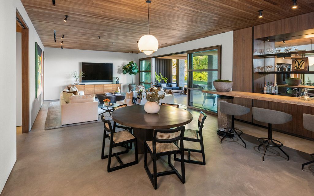 The Home in Beverly Hills is a true trophy of mid century modern design showcasing luxury, unparalleled scale and sophistication now available for sale. This home located at 960 N Alpine Dr, Beverly Hills, California