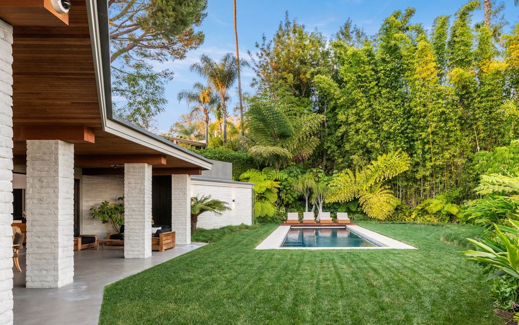 The Home in Beverly Hills is a true trophy of mid century modern design showcasing luxury, unparalleled scale and sophistication now available for sale. This home located at 960 N Alpine Dr, Beverly Hills, California