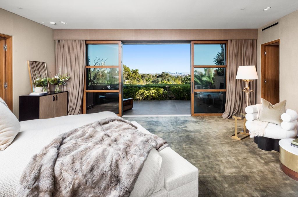 The Home in Beverly Hills is a true trophy of mid century modern design showcasing luxury, unparalleled scale and sophistication now available for sale. This home located at 960 N Alpine Dr, Beverly Hills, California