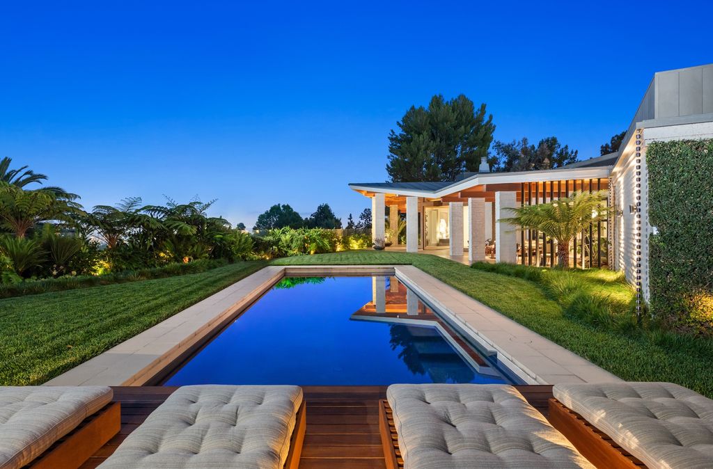 The Home in Beverly Hills is a true trophy of mid century modern design showcasing luxury, unparalleled scale and sophistication now available for sale. This home located at 960 N Alpine Dr, Beverly Hills, California