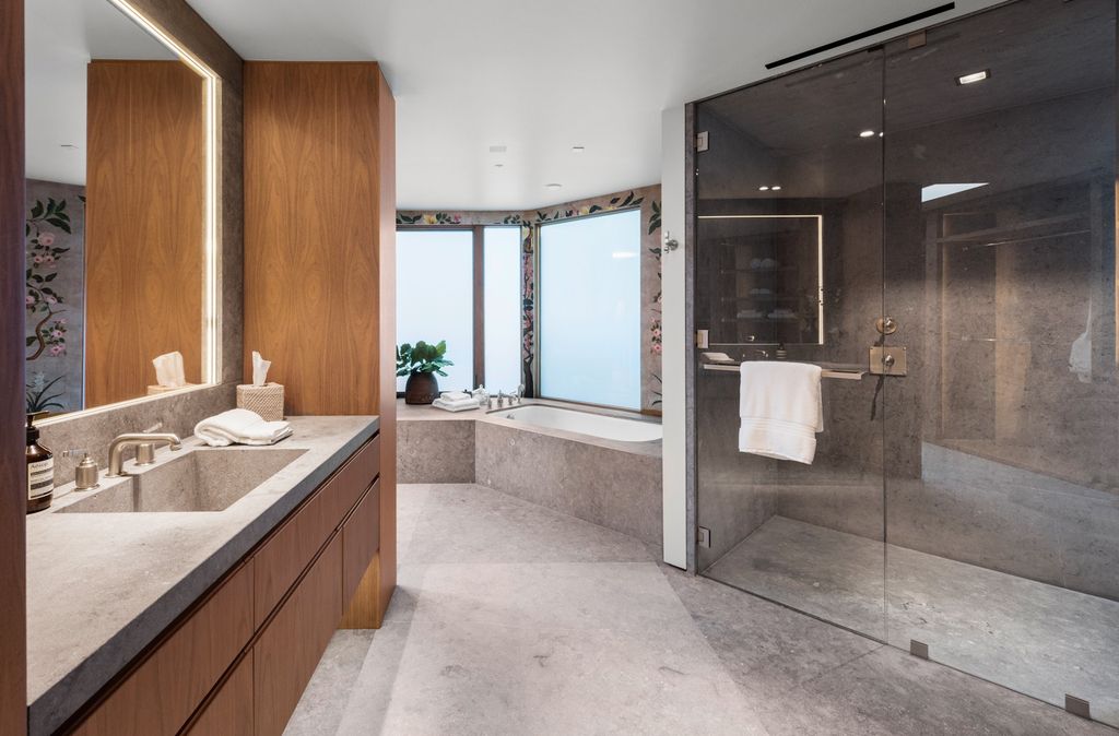 The Home in Beverly Hills is a true trophy of mid century modern design showcasing luxury, unparalleled scale and sophistication now available for sale. This home located at 960 N Alpine Dr, Beverly Hills, California