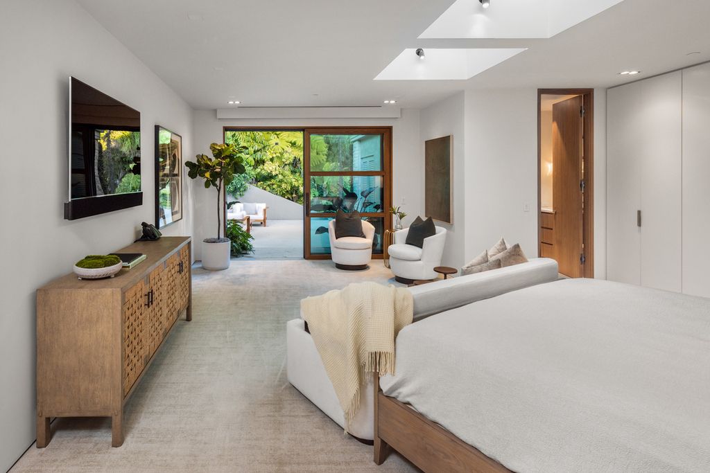 The Home in Beverly Hills is a true trophy of mid century modern design showcasing luxury, unparalleled scale and sophistication now available for sale. This home located at 960 N Alpine Dr, Beverly Hills, California
