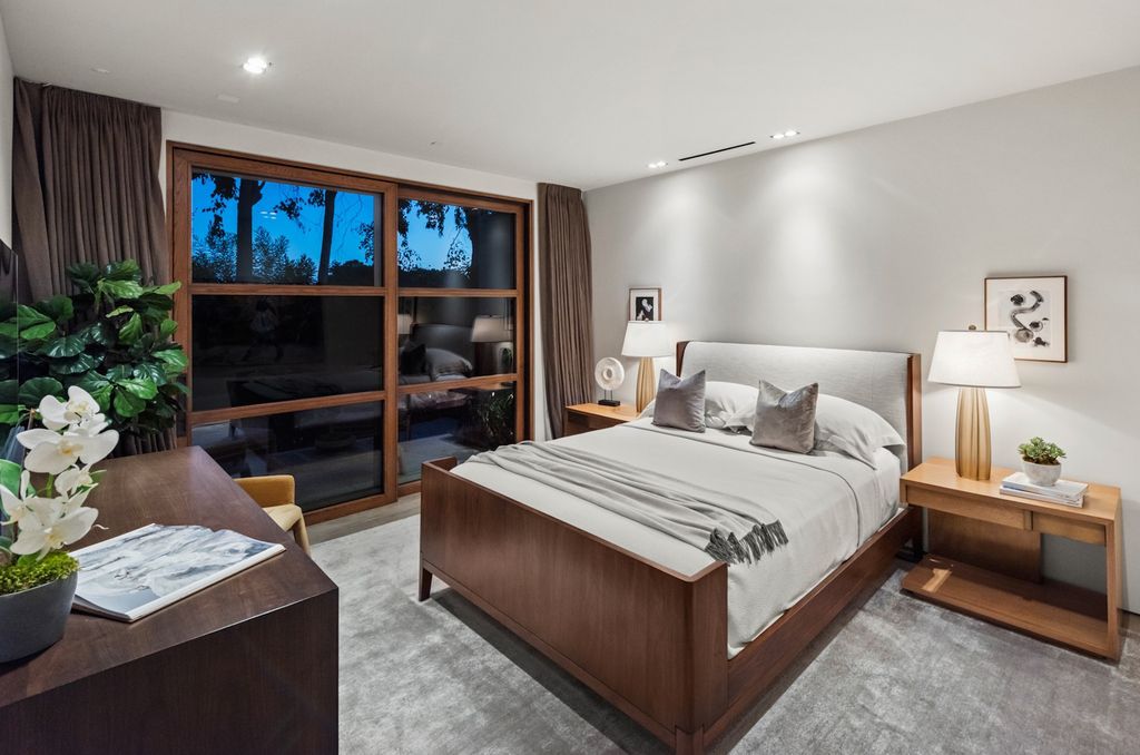The Home in Beverly Hills is a true trophy of mid century modern design showcasing luxury, unparalleled scale and sophistication now available for sale. This home located at 960 N Alpine Dr, Beverly Hills, California