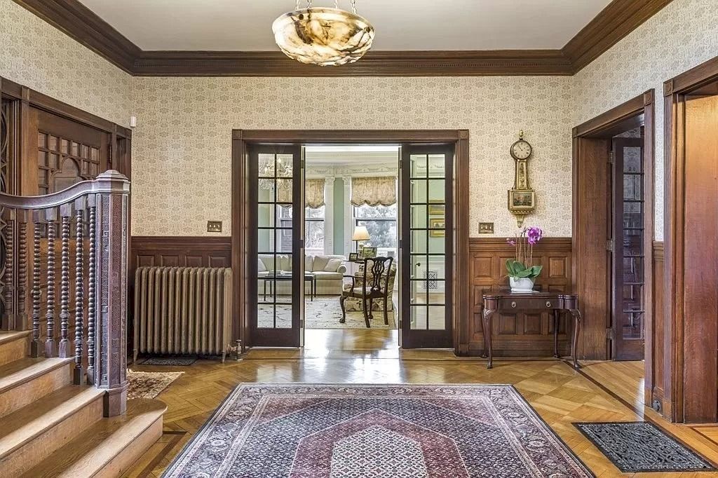 The Home in Massachusetts is a luxurious home having elegant rooms with carved-oak staircase, cherry-paneled and oak-paneled walls now available for sale. This home located at 16 Fairmont Ave, Newton, Massachusetts; offering 07 bedrooms and 07 bathrooms with 8,542 square feet of living spaces.