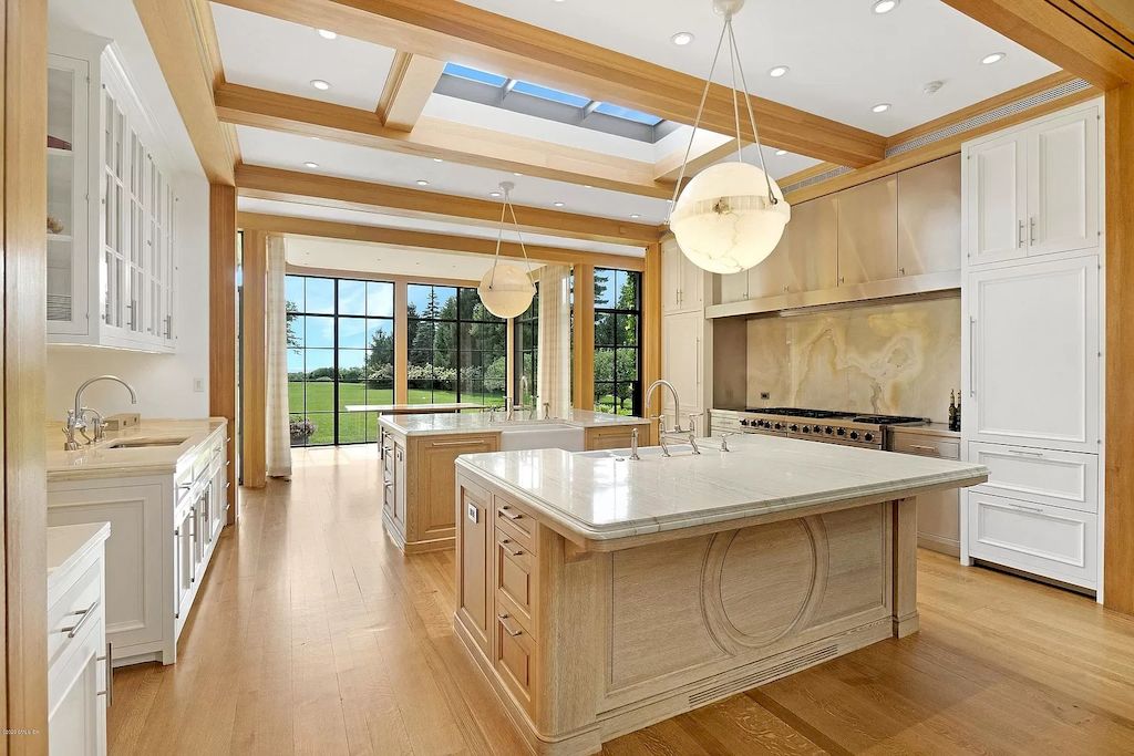 The Home in Connecticut is a luxurious home which is harmoniously combines modern and tradition aesthetics while using the finest materials and workmanship now available for sale. This home located at 15 Dairy Rd, Greenwich, Connecticut; offering 07 bedrooms and 13 bathrooms with 16,359 square feet of living spaces.