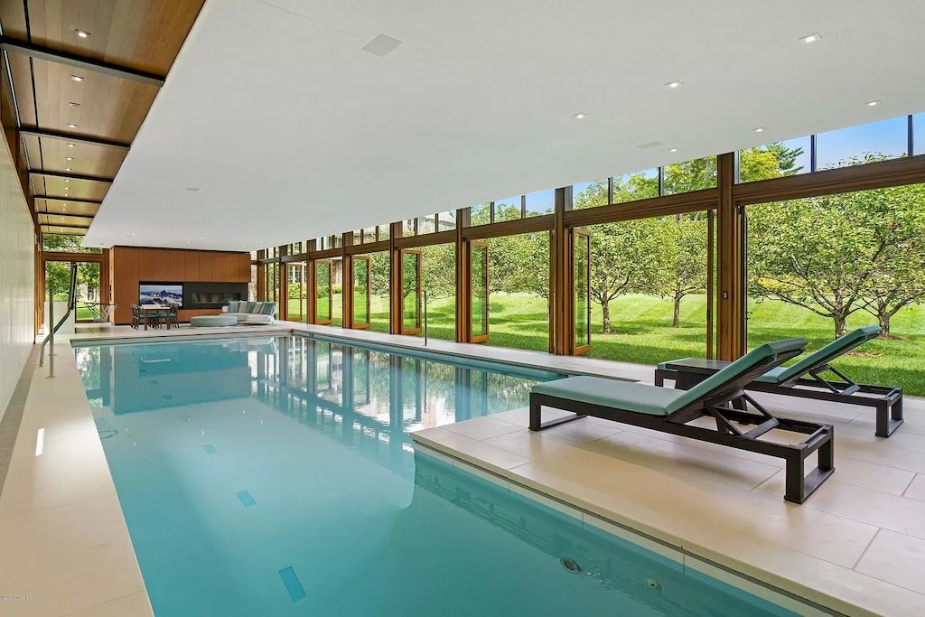 The Home in Connecticut is a luxurious home which is harmoniously combines modern and tradition aesthetics while using the finest materials and workmanship now available for sale. This home located at 15 Dairy Rd, Greenwich, Connecticut; offering 07 bedrooms and 13 bathrooms with 16,359 square feet of living spaces.