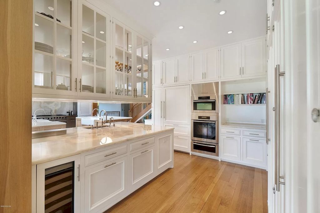 The Home in Connecticut is a luxurious home which is harmoniously combines modern and tradition aesthetics while using the finest materials and workmanship now available for sale. This home located at 15 Dairy Rd, Greenwich, Connecticut; offering 07 bedrooms and 13 bathrooms with 16,359 square feet of living spaces.