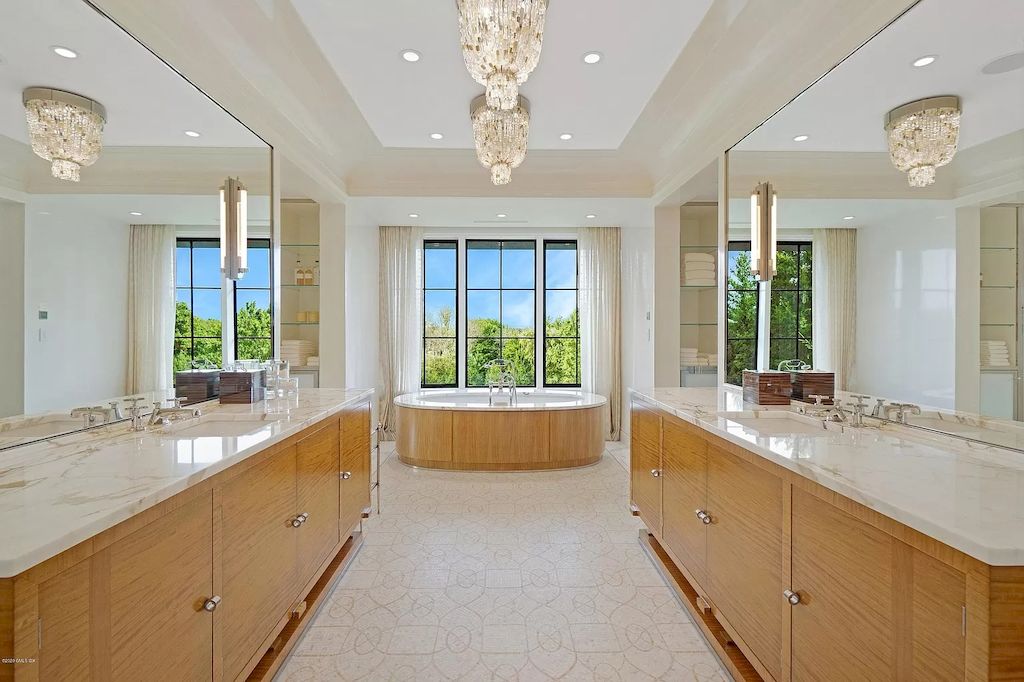 The Home in Connecticut is a luxurious home which is harmoniously combines modern and tradition aesthetics while using the finest materials and workmanship now available for sale. This home located at 15 Dairy Rd, Greenwich, Connecticut; offering 07 bedrooms and 13 bathrooms with 16,359 square feet of living spaces.