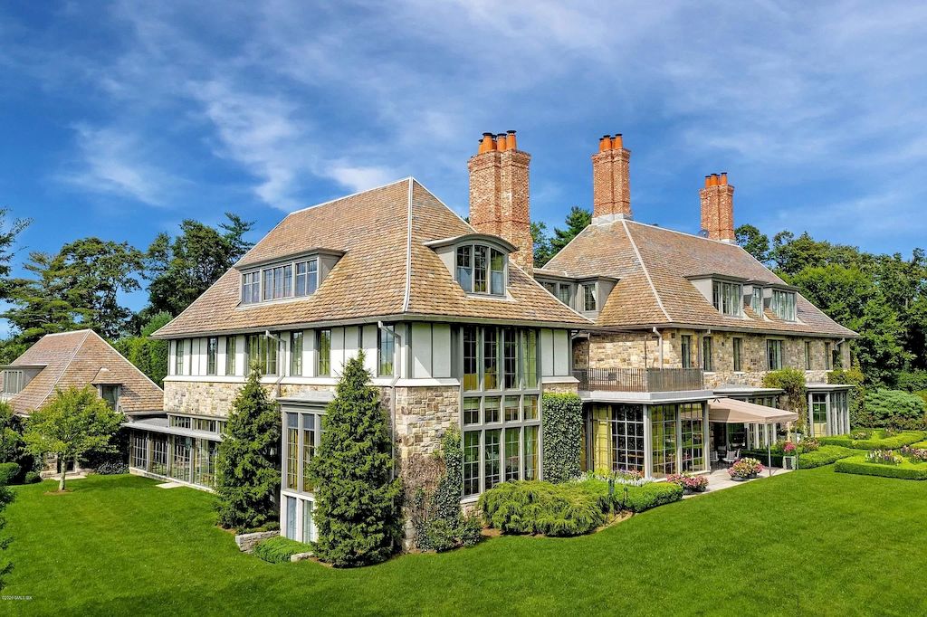 The Home in Connecticut is a luxurious home which is harmoniously combines modern and tradition aesthetics while using the finest materials and workmanship now available for sale. This home located at 15 Dairy Rd, Greenwich, Connecticut; offering 07 bedrooms and 13 bathrooms with 16,359 square feet of living spaces.