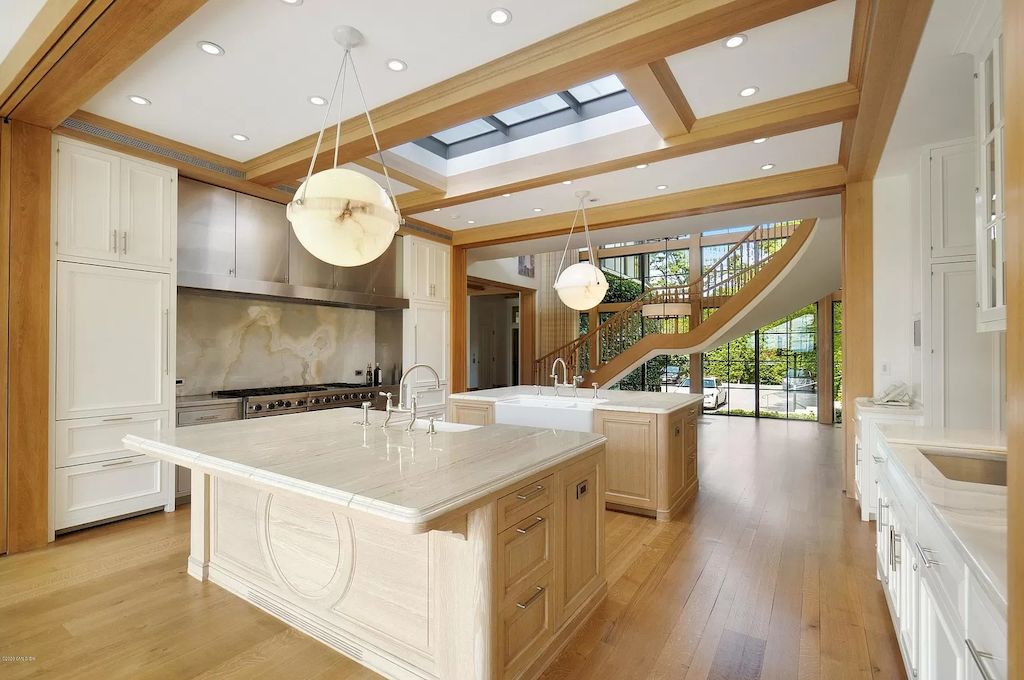 The Home in Connecticut is a luxurious home which is harmoniously combines modern and tradition aesthetics while using the finest materials and workmanship now available for sale. This home located at 15 Dairy Rd, Greenwich, Connecticut; offering 07 bedrooms and 13 bathrooms with 16,359 square feet of living spaces.
