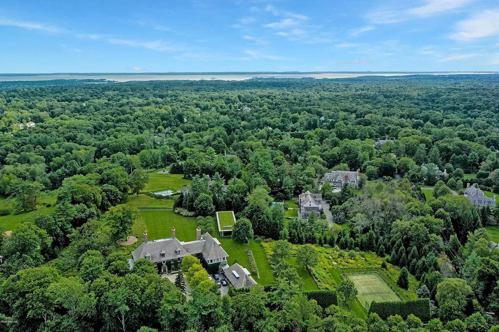The Home in Connecticut is a luxurious home which is harmoniously combines modern and tradition aesthetics while using the finest materials and workmanship now available for sale. This home located at 15 Dairy Rd, Greenwich, Connecticut; offering 07 bedrooms and 13 bathrooms with 16,359 square feet of living spaces.