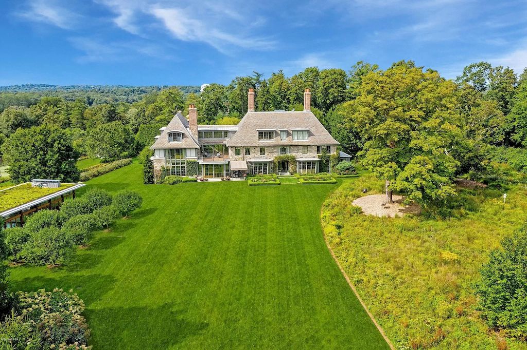 The Home in Connecticut is a luxurious home which is harmoniously combines modern and tradition aesthetics while using the finest materials and workmanship now available for sale. This home located at 15 Dairy Rd, Greenwich, Connecticut; offering 07 bedrooms and 13 bathrooms with 16,359 square feet of living spaces.