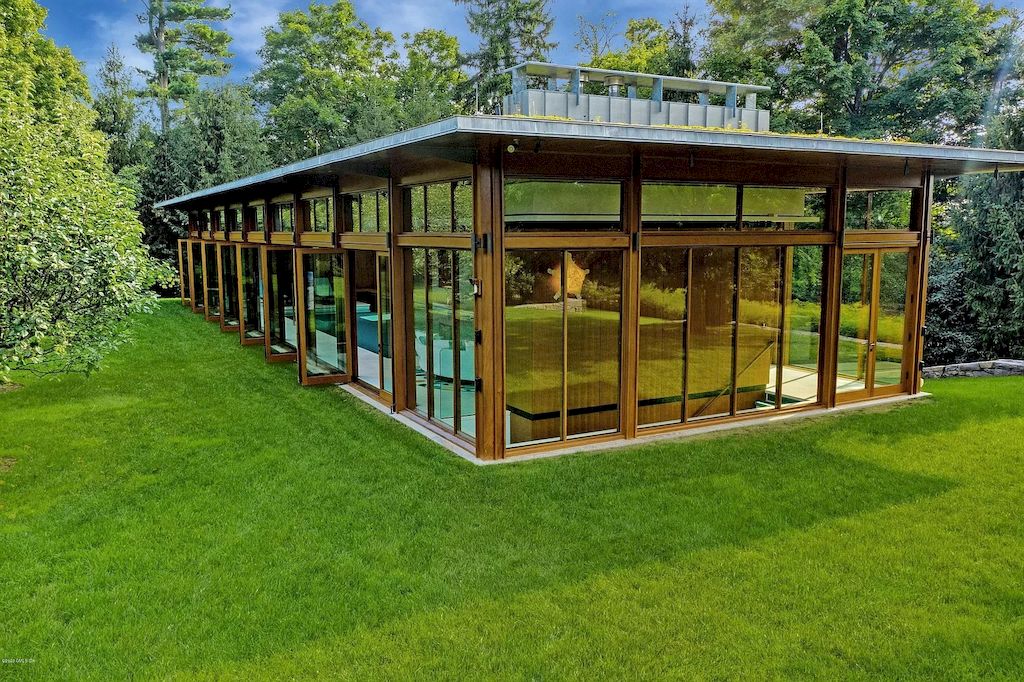 The Home in Connecticut is a luxurious home which is harmoniously combines modern and tradition aesthetics while using the finest materials and workmanship now available for sale. This home located at 15 Dairy Rd, Greenwich, Connecticut; offering 07 bedrooms and 13 bathrooms with 16,359 square feet of living spaces.