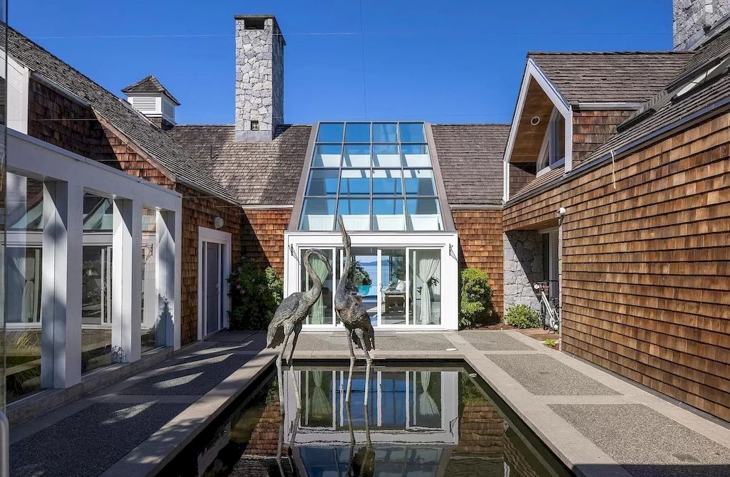 The Home in Saanich is an oceanfront oasis with abundant use of granite & quality construction, now available for sale. This home located at 4035 Locarno Ln, Saanich, BC V8N 3Z9, Canada