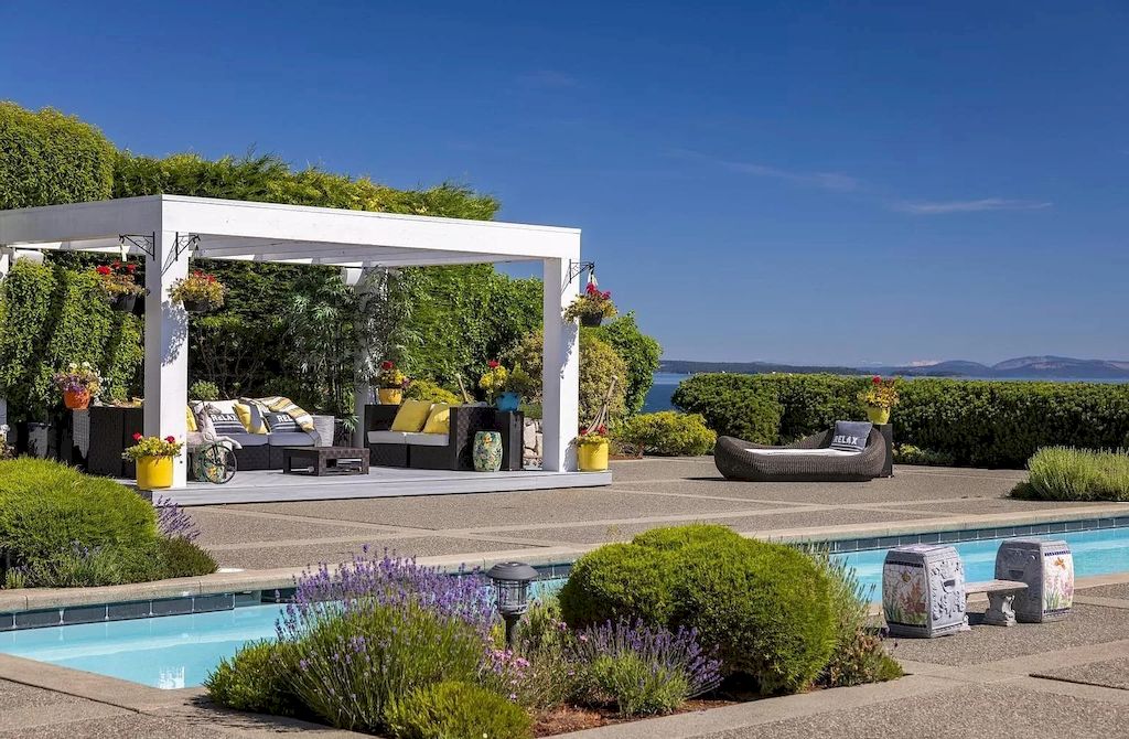 The Home in Saanich is an oceanfront oasis with abundant use of granite & quality construction, now available for sale. This home located at 4035 Locarno Ln, Saanich, BC V8N 3Z9, Canada