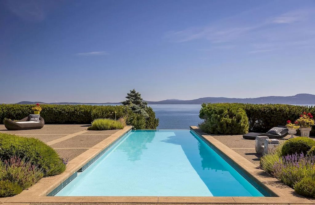 The Home in Saanich is an oceanfront oasis with abundant use of granite & quality construction, now available for sale. This home located at 4035 Locarno Ln, Saanich, BC V8N 3Z9, Canada