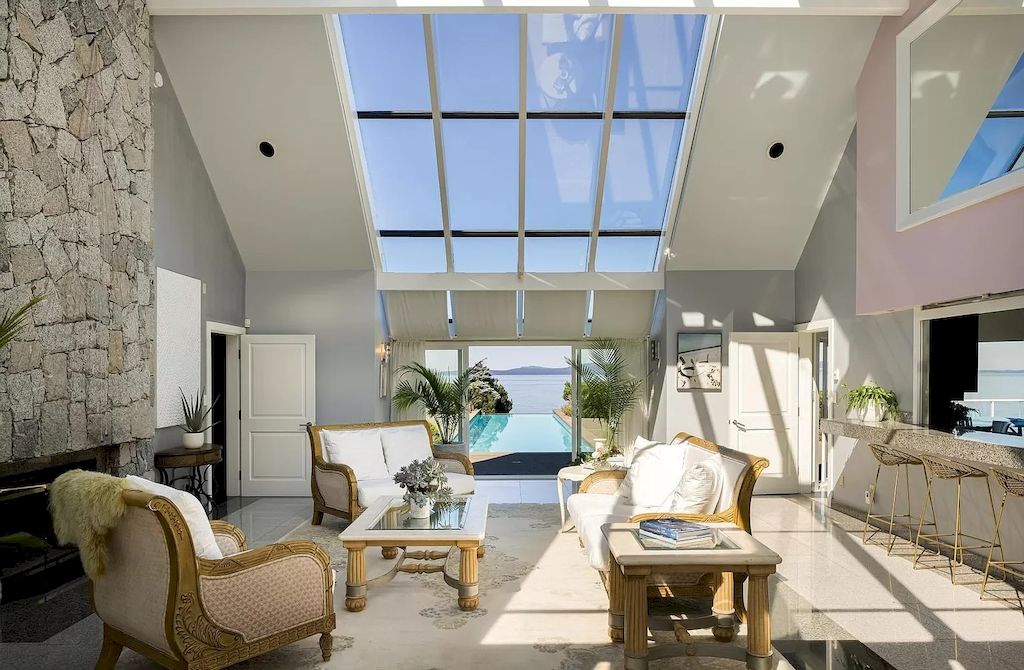 The Home in Saanich is an oceanfront oasis with abundant use of granite & quality construction, now available for sale. This home located at 4035 Locarno Ln, Saanich, BC V8N 3Z9, Canada