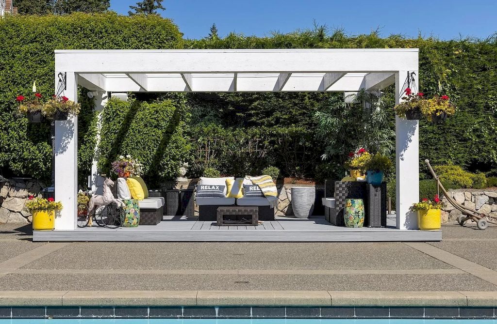The Home in Saanich is an oceanfront oasis with abundant use of granite & quality construction, now available for sale. This home located at 4035 Locarno Ln, Saanich, BC V8N 3Z9, Canada