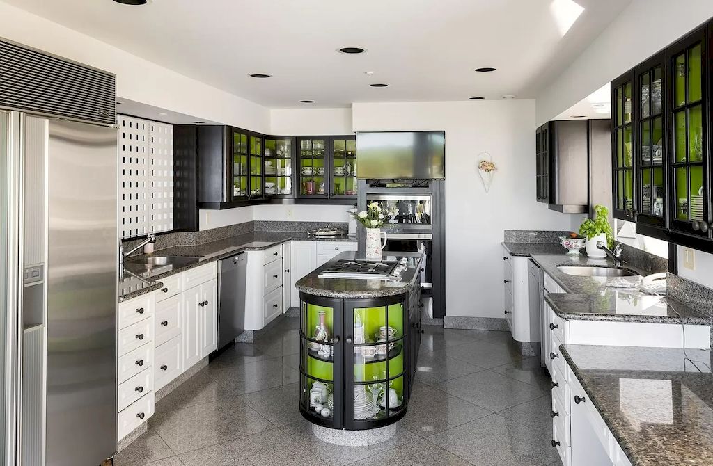 The Home in Saanich is an oceanfront oasis with abundant use of granite & quality construction, now available for sale. This home located at 4035 Locarno Ln, Saanich, BC V8N 3Z9, Canada